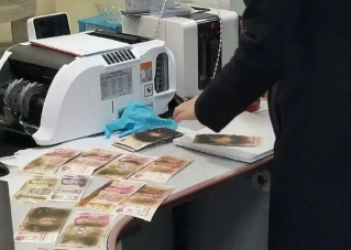 現(xiàn)金微波爐消毒被燒焦，華視錢(qián)幣消毒器保安全